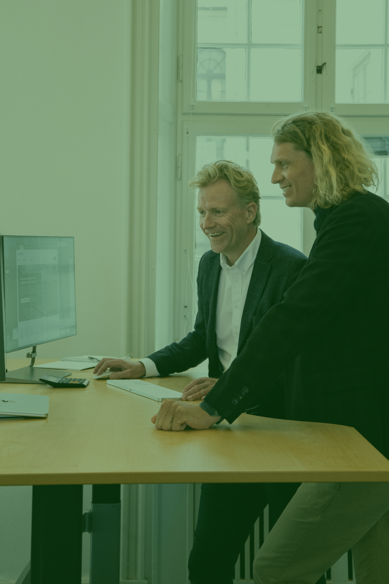The MORREL maritime team collaborating in the office